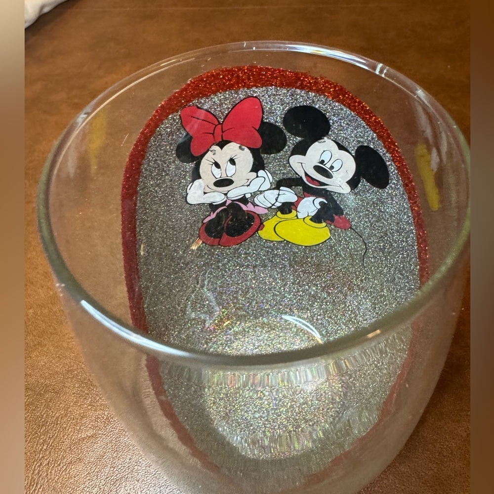 Brand new. Never used. Disney Mickey and Minnie handmade stemless wine glass 🍷.